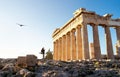 Greece, Athens. Tourist couple at Acropolis. Two people at Parthenon ruins. Travel and tourism. Woman and man on romantic date. Royalty Free Stock Photo