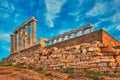 Poseidon temple ruins on Cape Sounio on sunset, Greece Royalty Free Stock Photo