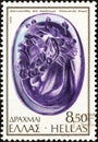 GREECE - CIRCA 1976: A stamp printed in Greece shows Head of Silenus, sardonyx, Hellenistic period, circa 1976. Royalty Free Stock Photo