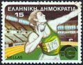 GREECE - CIRCA 1985: A stamp printed in Greece shows a shot putter athlete, circa 1985. Royalty Free Stock Photo