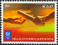 GREECE - CIRCA 2004: A stamp printed in Greece from the `Olympic Games, Athens` issue shows a relay race, circa 2004.