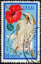 GREECE - CIRCA 1958: A stamp printed in Greece shows Venus and Adonis Venus and hibiscus, circa 1958.