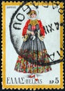 GREECE - CIRCA 1974: A stamp printed in Greece shows a woman from Skopelos island, circa 1974.
