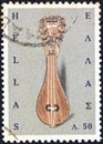 GREECE - CIRCA 1966: A stamp printed in Greece from the `Greek Popular Art` issue shows a Cretan lyre, circa 1966.