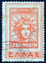 GREECE - CIRCA 1947: A stamp printed in Greece shows Apollo Helios god portrait from an older Rhodian stamp , circa 1947.