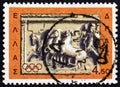 GREECE - CIRCA 1964: A stamp printed in Greece shows Chariot racing, marble votive relief, circa 1964.