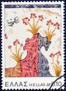 GREECE - CIRCA 1973: A stamp printed in Greece shows Spring wall fresco from Island of Thera Royalty Free Stock Photo