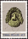 GREECE - CIRCA 1966: A stamp printed in Greece shows Tragedian`s Mask of 4th Century BC, circa 1966. Royalty Free Stock Photo
