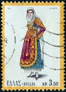 GREECE - CIRCA 1973: A stamp printed in Greece shows a woman from Salamis island, circa 1973.