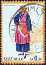 GREECE - CIRCA 1972: A stamp printed in Greece shows a woman from Trikeri rural, circa 1972. Royalty Free Stock Photo