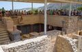 Greece, Crete. Tourists visiting the Knossos ruins, ceremonial and political centre of the tsar Minos. Royalty Free Stock Photo