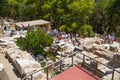 Greece, Crete. Tourists visiting the Knossos ruins, ceremonial and political centre of the tsar Minos. Royalty Free Stock Photo