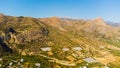 Greece, Crete, landscape with olive trees and tiny mountain village Royalty Free Stock Photo