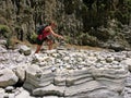 Greece, Crete, Samaria gorge, young woman, pyramid from stones