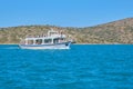 09.09.2019. Greece Crete. Tourist motor boat cruise, blue aegean sea background, greek islands