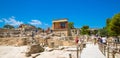 Greece, Crete. Tourists visiting the Knossos ruins, ceremonial and political centre of the tsar Minos.