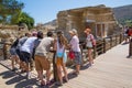Greece, Crete. Tourists visiting the Knossos ruins, ceremonial and political centre of the tsar Minos. Royalty Free Stock Photo