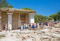 Greece, Crete. Tourists visiting the Knossos ruins, ceremonial and political centre of the tsar Minos. Royalty Free Stock Photo