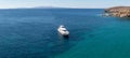 Greece Cyclades island. Moored luxury yacht in calm deep Aegean sea water background. Banner Royalty Free Stock Photo