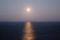 Greece, Sifnos island, view of the full moon over the sea. Royalty Free Stock Photo