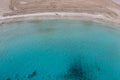 Greece, Cyclades. Sandy beach turquoise color sea water aerial drone view Royalty Free Stock Photo