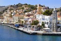 Greece. Dodecanese. Islands Symi.Colorful houses and boats .