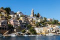 Greece. Dodecanesse. Island Symi. Colorful houses on rocks. Italian architecture, doll houses on the slopes of rocky Royalty Free Stock Photo