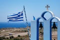 Greece flag and bell tower of the church on greek landscape background Royalty Free Stock Photo