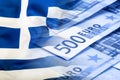 Greece flag. Euro money. Euro currency. Colorful waving greece flag on a euro money background Royalty Free Stock Photo