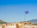 Greece flag at the Parthenon temple at the Acropoli