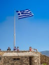 Greece flag at the Parthenon temple at the Acropoli