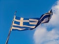 Greece Flag waving on blue sky background Royalty Free Stock Photo