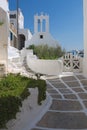 Greece, the island of Ios. A small chapel on a narrow alleyway. Royalty Free Stock Photo