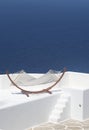 Greece, Sikinos. A hammock on a terrace. Royalty Free Stock Photo