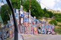 Roadside display of Greek rugs for sale