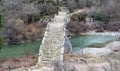 Greece Kalogeriko or Plakidas stone bridge, Zagoria Epirus. View from footbridge rocky path Royalty Free Stock Photo