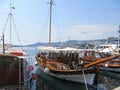 Greece, Kavala - Sertember 10, 2014. ancient wooden boats in Greece moored to the shore