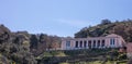 Greece, Kea island. Old public school, neoclassical building above on the hill