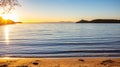 Greece, Kea island, sunset at the beach. Sun falling, seascape with lighthouse Royalty Free Stock Photo