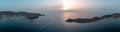 Greece, Kea Tzia island. Korrisia port and lighthouse on a rocky cape, sky, sea background Royalty Free Stock Photo