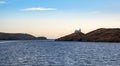 Greece, Kea Tzia island. Seascape with lighthouse, clear blue sky