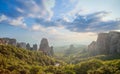 Greece Meteora panoramic view. Meteora valley rocks, monastery and sky clouds Royalty Free Stock Photo