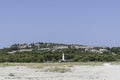 Greece, Possidi, village seen from the beach with a white lighthouse