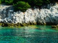 Greece rocky coasline, green, blue, turqouise, aquamarine water, mediterranean sea.