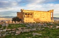 Greece - Ruins of Erechtheion temple in Athens during the sunrise at the Acropolis hill Royalty Free Stock Photo