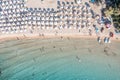 Greece, sandy beach, aerial drone view. People swim and relax at Stoupa beach Mani, Peloponnese