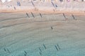 Greece, sandy beach, aerial drone view. People swim and relax at Stoupa beach Mani, Peloponnese