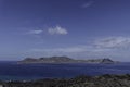 Greece, Santorini, The island of Thirasia and its crocodile head from the volcanic island of Nea Kameni