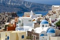 Fira town with white houses and blue roofs