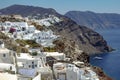 Fira town with white houses and blue roofs